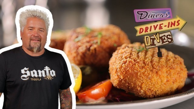 'Guy Fieri Eats NewFoundLand Cod Cakes | Diners, Drive-Ins and Dives | Food Network'