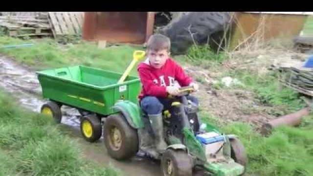 'Kids playing on tractors, digging & shovelling mud, children on the farm. TRACTOR SONG'