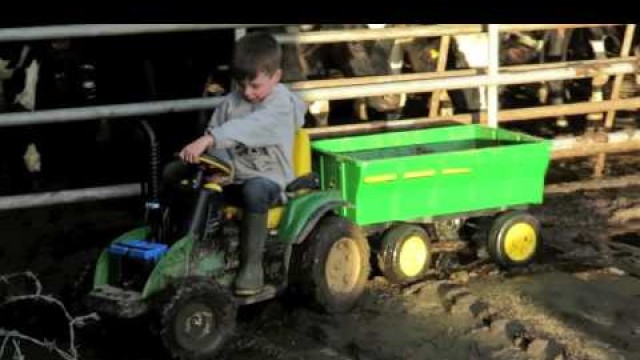 'Kids playing on tractors in the mud & john deere gators, children on the farm. TRACTOR SONG'