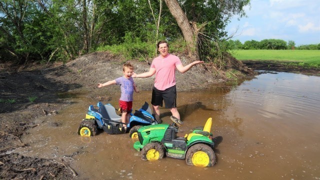 'Playing on the farm in the mud | Our tractors get stuck | Kids mudding'