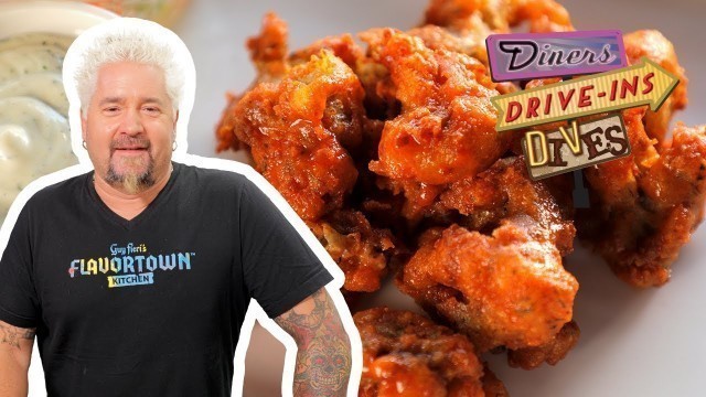 'Guy Fieri Eats Buffalo Cauliflower Wings | Diners, Drive-Ins and Dives | Food Network'