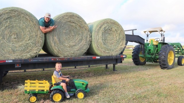 'Moving hay bales around the farm | Tractors working for kids'