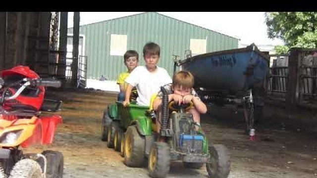 'Kids playing on ride on tractors, tractor trailer, john deere, peg perego 12v'