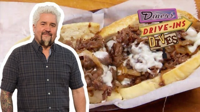 'Guy Fieri Eats a Cheesesteak on HOMEMADE Bread | Diners, Drive-Ins and Dives | Food Network'