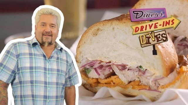 'Guy Fieri Eats a Peruvian Chicharron Sandwich | Diners, Drive-Ins and Dives | Food Network'