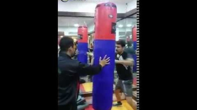 'Punch it hard. boxing exercise in planet fitness raipur'