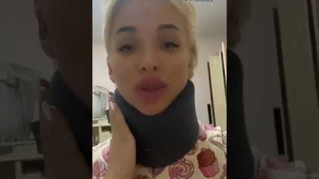 'Russian Fitness Model in a Neck Brace (воротника Шанца)'