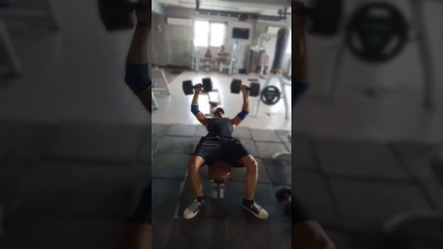 'fintnesstownguru #shorts#short#fitness#motivation#viral#youtubeshorts#ytshorts #dumbbell press'