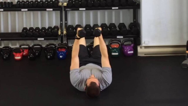 'Chest Fly on Ground DBs | Exercise Library'