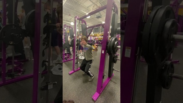 'Kid Squats 245 pounds 