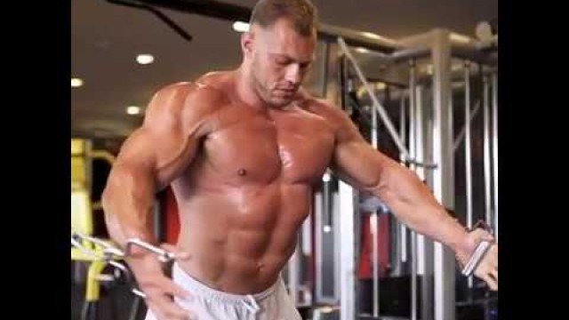 'Blond muscle god Pawel Koch (Poland) displays his superiority at the gym! On your knees!'