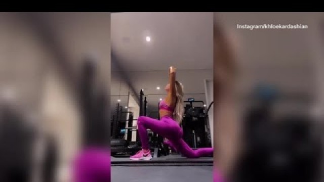 'Viral Video- Khloe Kardashian puts her toned abs on display during workout'