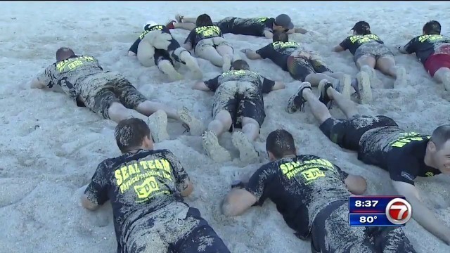 'Office employees endure Navy SEAL training on Haulover Beach'